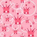 Layered pink crowns for kids. Girly objects of princess seamless pattern with dots and circles on the background.