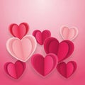 Layered pink and red heart shapes arranged on a gradient pink background. Various sizes of hearts Royalty Free Stock Photo