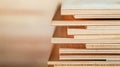Close up of plywood sheets revealing layered structure, highlighting manufacturing process and potential use in construction or Royalty Free Stock Photo