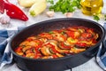 Layered ratatouille in a baking dish, close up