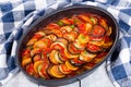 Layered ratatouille in a baking dish, close-up