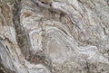 Layered rock, deformed. Royalty Free Stock Photo