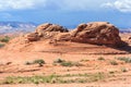 Layered rock in dry and arid desert around Glen Canyon National Recreation Area