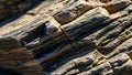 Layered rock formation with distinct stratification featuring alternating Royalty Free Stock Photo