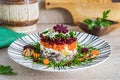 Layered salad with beets, carrots and herring Royalty Free Stock Photo