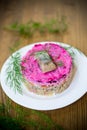 Layered salad of boiled vegetables with beets and herring Royalty Free Stock Photo