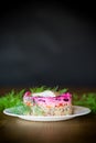 Layered salad of boiled vegetables with beets and herring Royalty Free Stock Photo