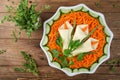 Layered salad with Korean carrot with spring decoration Calla li