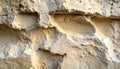 Layered Sandstone Texture with Eroded Pockets and Sunlight erosion natural Royalty Free Stock Photo