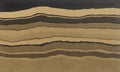 Layered sanstone rock background. Sedimentary layers