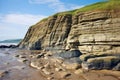 layered sedimentary rocks in a coastal landscape