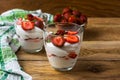 Layered strawberries dessert with cream cheese on rustic wooden Royalty Free Stock Photo