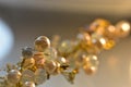 Layered triangular macro diamond shapes with a small diamond over them with bokeh background Description92/200 Backgrounds/
