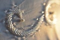 Layered triangular macro diamond shapes with a small diamond over them with bokeh background Description92/200 Backgrounds/