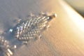 Layered triangular macro diamond shapes with a small diamond over them with bokeh background Description92/200 Backgrounds/