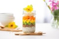 layered tropical chia pudding with papaya, pineapple chunks