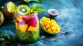 Layered Tropical Fruit Smoothie in Glass Jar Royalty Free Stock Photo