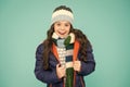 Layered up for wintry weather. Happy child with winter look. Little girl smile in casual winter style. Fashion winter Royalty Free Stock Photo