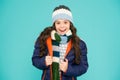 Layered up for wintry weather. Happy child with winter look. Little girl smile in casual winter style. Fashion winter Royalty Free Stock Photo