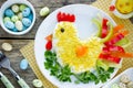 Layered vegetable egg salad in shape Easter chicken