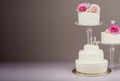 layered wedding cake with roses and cream on neutral background AI, minimalist style, tone on tone colors Royalty Free Stock Photo