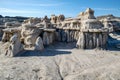 Layers of columns support horizontal segments of sandstone at the Bisti Badlands