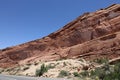 Layers of Entrada and Navajo sandstone lining the road in Arches National Park in Moab, Utah