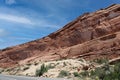 Layers of Entrada and Navajo sandstone lining the road in Arches National Park in Moab, Utah