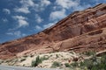 Layers of Entrada and Navajo sandstone lining the road in Arches National Park in Moab, Utah