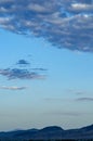 Mountain ranges under thick bank of morning rain clouds Royalty Free Stock Photo