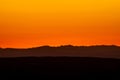 Layers Of Mountains And Sky Glow Orange at Sunset Royalty Free Stock Photo