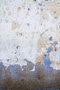 Layers of paint in old distressed wall