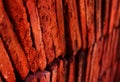 Layers of red terracotta tiles closeup photo