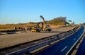 Laying asphalt highway construction work machines