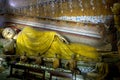 The Laying Buddha stutue in the Image House at Wewurukannala Vihara at Dickwella in Sri Lanka.