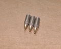 The laying cartriges 308 Winchester caliber with full metal jacket bullets steel case Royalty Free Stock Photo