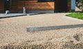 Laying gray concrete paving slabs in house courtyard driveway pa Royalty Free Stock Photo