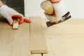 Laying hardwood parquet.