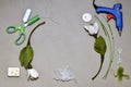 Arrangement of snowdrops made of wool with tools and ready made flowers, a frame with a free space in the center