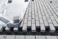 Laying new paving stones on the sidewalk. Construction work Royalty Free Stock Photo