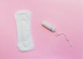 Feminine hygiene products: pad, swab. on a pink background Royalty Free Stock Photo