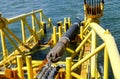 Laying of pipes with pipe-laying barge crane near the shore. Descent of the pipeline to a bottom exhausting with the pipelaying Royalty Free Stock Photo