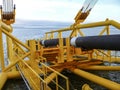 Laying of pipes with pipe-laying barge crane near the shore. Descent of the pipeline to a bottom exhausting with the pipelaying ba