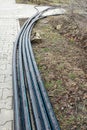 Laying of the sprinkler system of the pipeline in the ground trenches for the underground irrigation system, irrigation Royalty Free Stock Photo