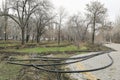 Laying of the sprinkler system of the pipeline in the ground trenches for the underground irrigation system, irrigation Royalty Free Stock Photo