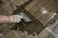 Laying tile stylized tree on the insulated floor. Royalty Free Stock Photo