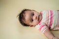 Laying time cute baby in studio Royalty Free Stock Photo