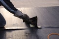 Laying of waterproofing sheathing and insulation on a roof Royalty Free Stock Photo