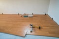 Laying wooden floor and tools during renovations