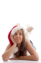 Laying young woman with christmas hat